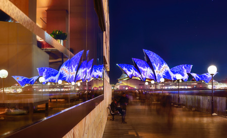 SYDNEY, AUSTRALIA - June 17, 2016, Sydney Opera House and reflection illuminated with colourful light design imagery, during the Vivid Sydney 2016 annual public event.のeditorial素材