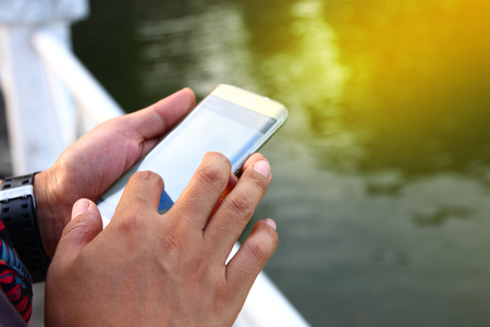 Men pressing the phone.の写真素材