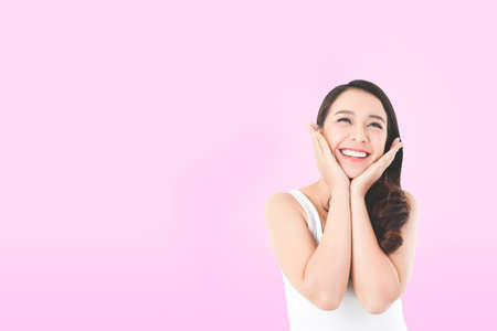 Beautiful Asian women feel happy. She takes care of the body and uses skin creams for good health....