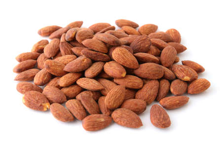 Almonds Placed on a white floor. Food photography concept. Top viewの写真素材