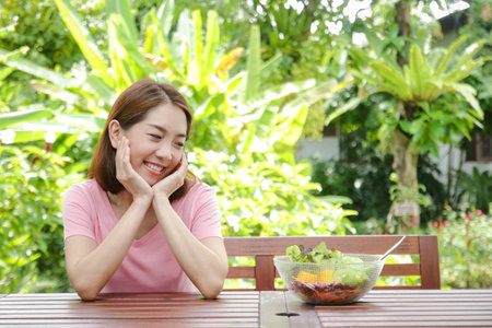 Asian women aged 40+ smiling happy. Choose foods that are good for your health. copy spaceの写真素材