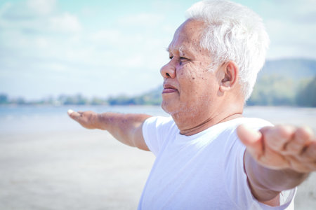 Healthy elderly men relax at the seaside.の写真素材