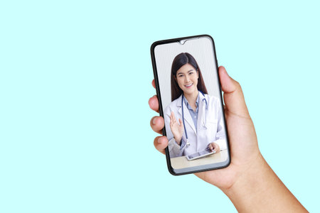 Online doctor concept Monitor patient health through a black smartphone connected to communication via online technology.の写真素材