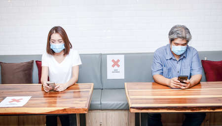 The concept of arranging a seating area in a restaurant
Social distancing prevents coronavirus infection. during the spread of the virusの写真素材