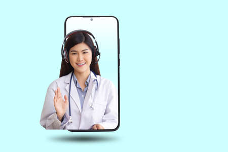 Black smartphone concept Connect to communication via online technology. The doctor can examine the patient via video call. Blue background. Clipping Pathの写真素材