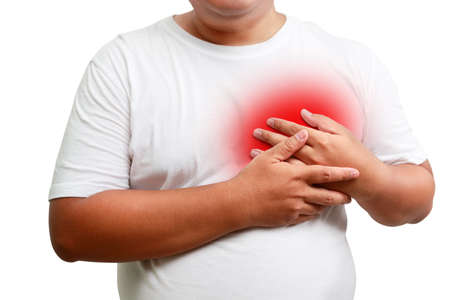 fat man wearing white shirt put your hand on the chest On the left, he had difficulty breathing. risk of coronary heart disease, diabetes, high blood pressure hyperlipidemia. isolated. Clipping Pathの写真素材