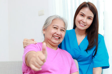 Portrait of physiotherapist or caregiver with happy smiling Asian seniors. Medical service concept. elderly health careの写真素材