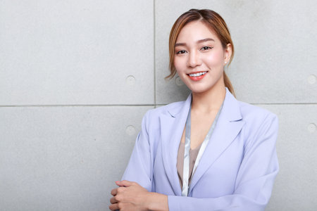 Portrait of a beautiful Asian businesswoman Wear a suit to work in the office. Business concept, Entrepreneurの写真素材