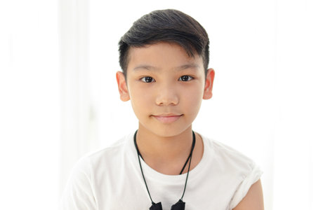 Portrait of an Asian boy smiling happy. Education concept, brain development both intellectual...