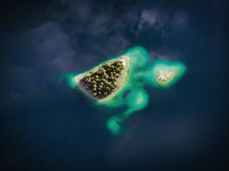 Aerial view of the turtle island in Lake Eibsee in Bavaria, Germanyの写真素材