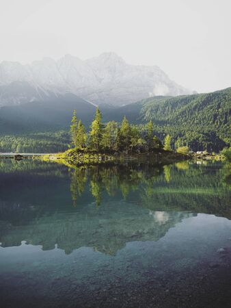 Island on Lake Eibsee infront of Zugspitze, Bavaria, Germany