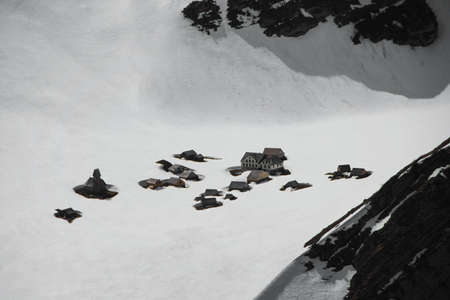 Idyllic remote alpine settlement Meglisalp Alpstein Appenzell Innerrhoden Switzerland covered in snow in winterの写真素材