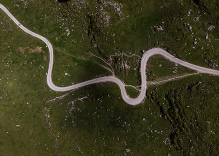 Aerial view of winding hiking trail path road in Alpstein mountains Appenzell alps Innerrhoden...