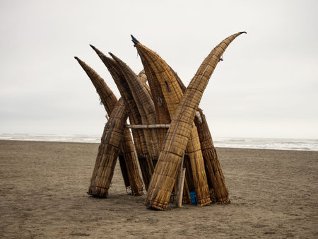 Traditional peruvian caballito de totora Balsa reed fishing boat raft canoe on Pimentel Beach Lambayeque Peruの写真素材