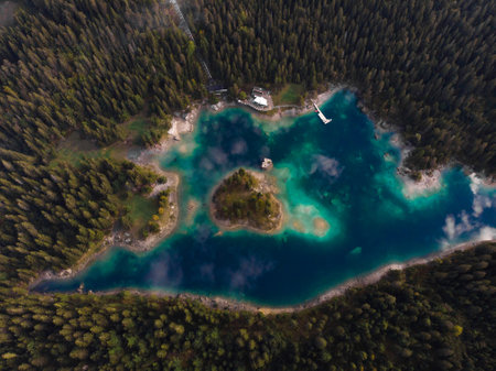 Aerial panorama of clear swiss alpine lake Caumasee Lag la Cauma Lai da Cauma near Flims Grisons...