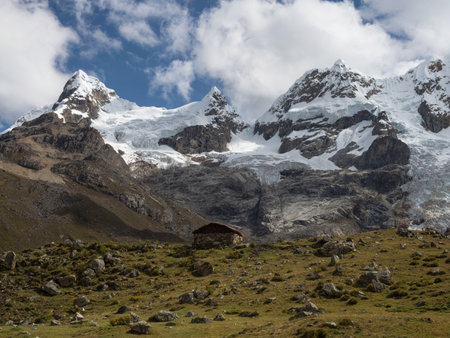 Panorama view of simple traditional hut on Cordillera Huayhuash Circuit andes alpine mountain Ancash Huanuco Peruの写真素材