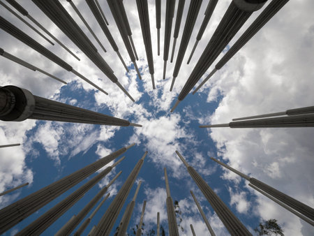 Panorama sky view of pillars concrete columns Parque de las luces Plaza Ciscneros Medellin Antioquia Colombiaの写真素材