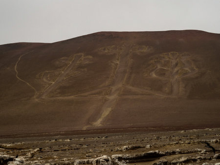 Prehistoric hill figure trident geoglyph El Candelabro Paracas Candelabra of the andes mythology at Islas Ballestas Peruの写真素材