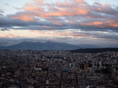 Aerial cityscape panorama of Quito skyline old historic town center modern architecture buildings from El Panecillo mountain hill Ecuador South Americaの写真素材