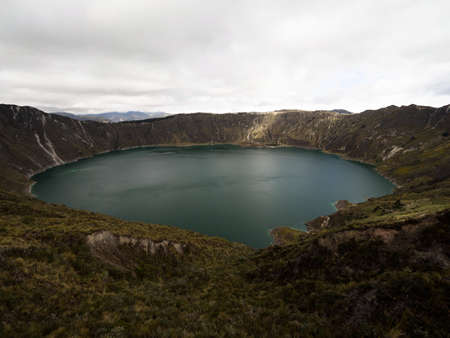 Panorama view of andean volcano caldera crater lake Quilotoa rim ridge loop in Pujili Cotopaxi Ecuador andes South Americaの写真素材