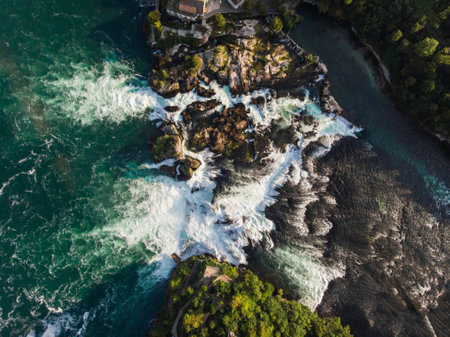 Aerial top down panorama of Rheinfall cascade rapid waterfall on Rhine river Neuhausen Schaffhausen Switzerland Germany Lake Constance Europeの写真素材