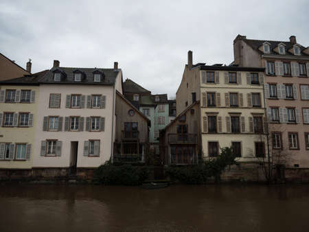 Charming picturesque old traditional architecture half-timbered houses buildings at Ill Rhine river in Strasbourg Grand Est Bas Rhin Alsace Petite France Europeの写真素材