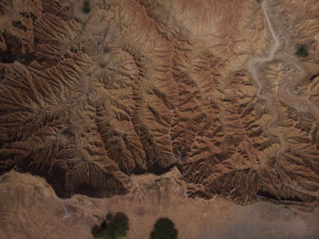 Aerial panorama view of Tatacoa desert tropical dry forest red sand stone labyrinth in Villavieja Neiva Huila Colombia South Americaの写真素材