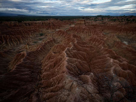 Panorama view of Tatacoa desert tropical dry forest red sand stone labyrinth in Villavieja Neiva...