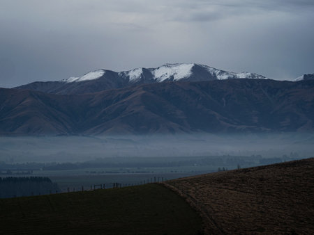 Panorama view of snow capped mountain range along Highway 79 between Fairline and Geraldine Timaru Canterbury South Island New Zealandの写真素材