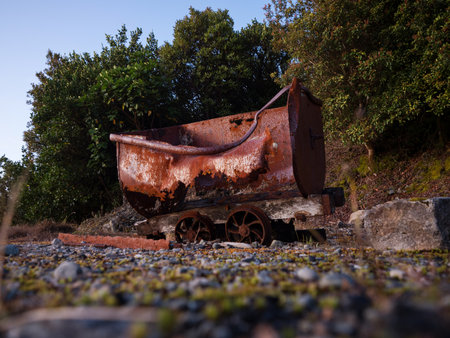 Old historic rusty wrecked wagon trolley on abandoned Denniston Incline, coal mining ropeway cable...