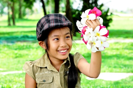 Cute little girl in the school holidaysの写真素材