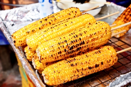 Closeup grilled corn vegetable food backgroundの写真素材