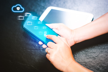 synchronization data from cloud with smartphone sceneの写真素材