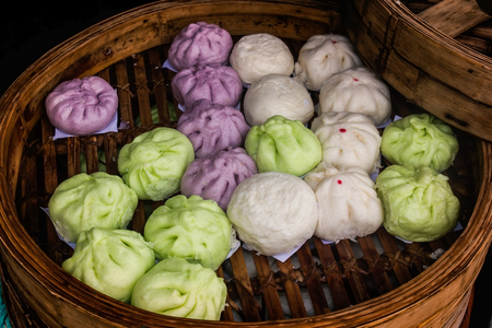 Chinese steam buns on a trayの写真素材