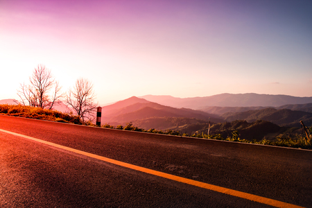Beautiful view rural road with sunset in mountain,nature landscape backgroundの写真素材