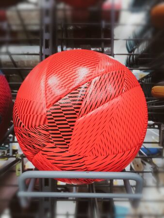 Sports football red colors for sale in the shop sportswear backgroundsの写真素材