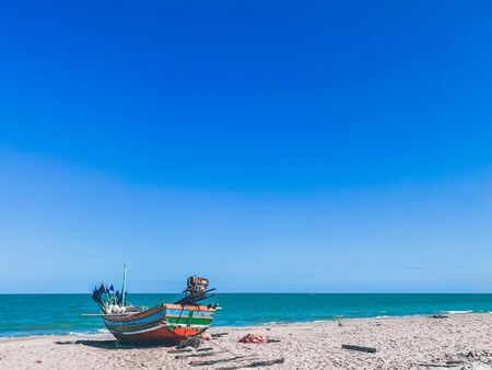Fishing boat on the beach nature tropical island backgrounds