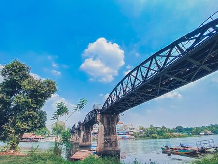 Old steel bridge over river nature landscape backgroundsの写真素材