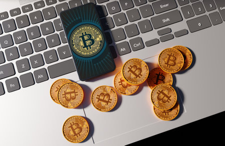 Gold metal bitcoin trading on smartphone and laptop scene 3D rendering business wallpaper backgroundsの写真素材