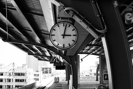 Timetable at the Central Station, Clock in the railway station. Clock Station and Close up of an analog clock.の写真素材