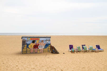 Detail of wooden panels and railings on a traditional roller coaster amusement ride at a British seaside resort.の写真素材