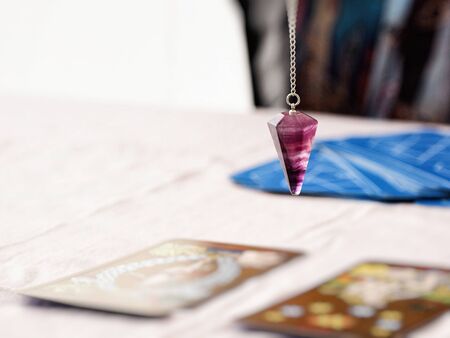Tarot Divination and Pendulum