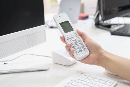 Women answer the phoneの写真素材
