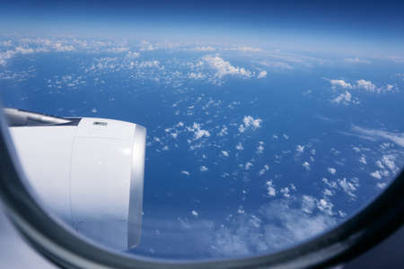 The sky seen from the window of the airplaneの写真素材