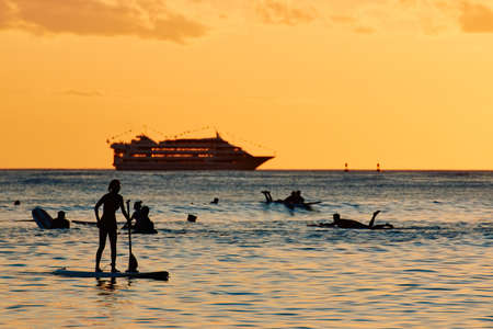 Tourists swimming at Waikiki Beach, Hawaii