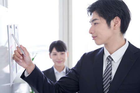 A Japanese business person meeting in a conference roomの写真素材