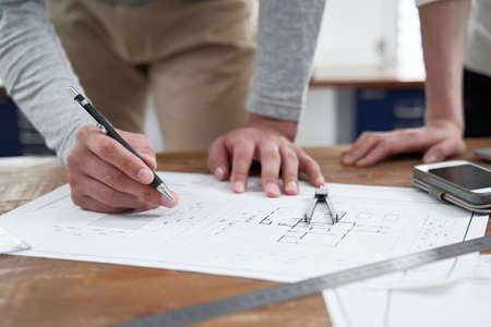A Japanese architect meeting in a casual office