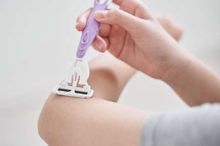 Japanese girl junior high school student who processes waste hair with a razor