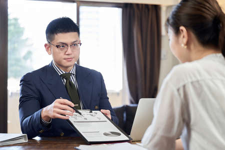 Asian male businessman explaining business planの写真素材