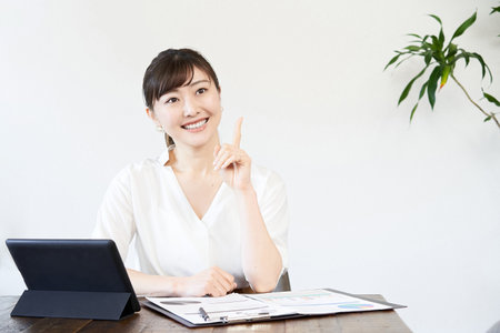 Asian businesswoman those who come up with ideas at workの写真素材